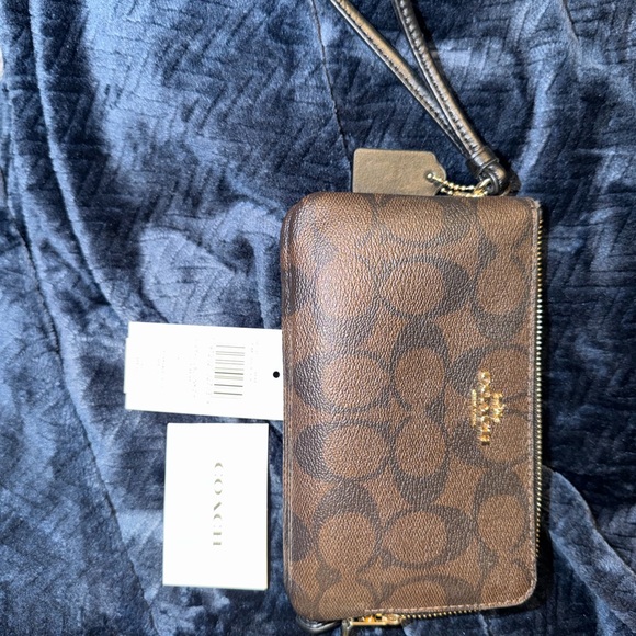 Coach Handbags - Coach Black and Gold Zip Wallet